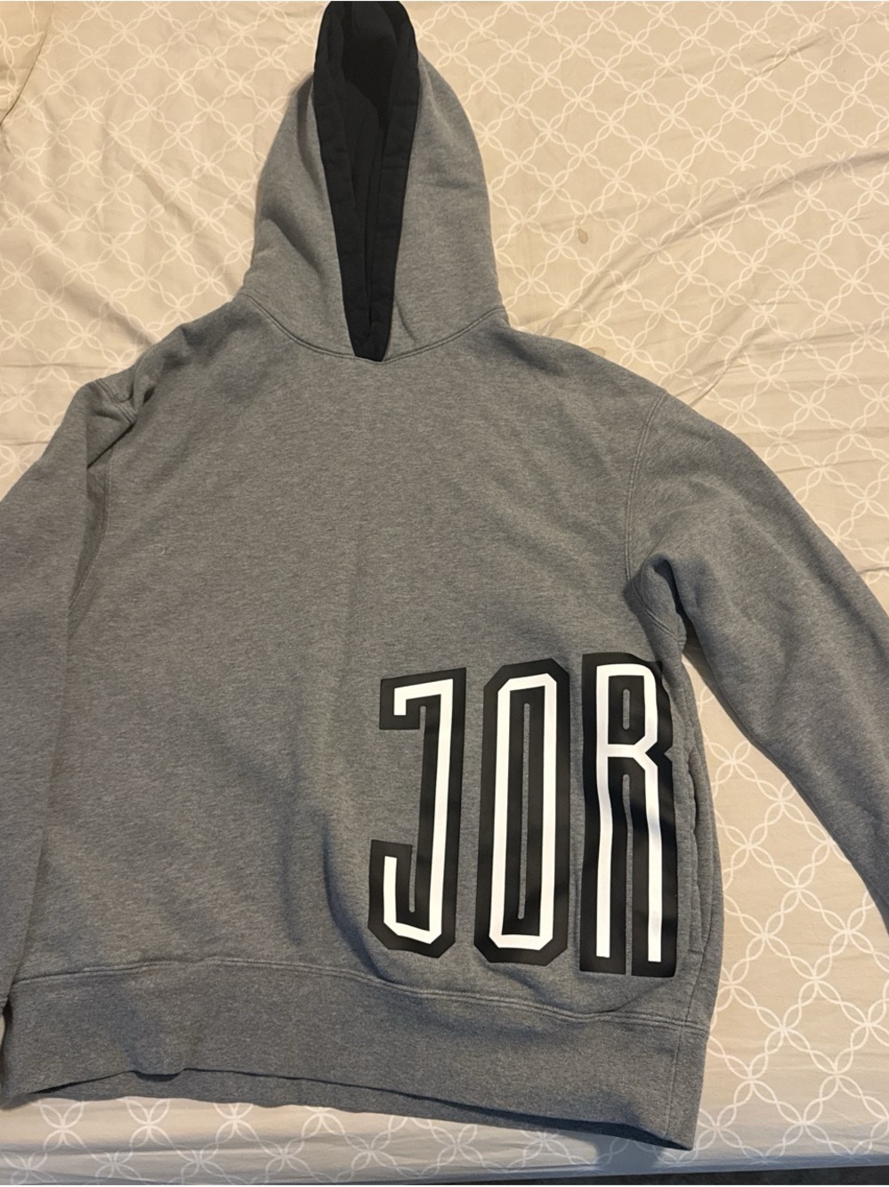 Jordan Gray Hoodie with Black-Lined Hood and Bold JORDAN Graphic with pockets
